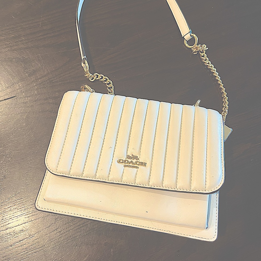 Coach white bag . Rarely used. Very good condition.